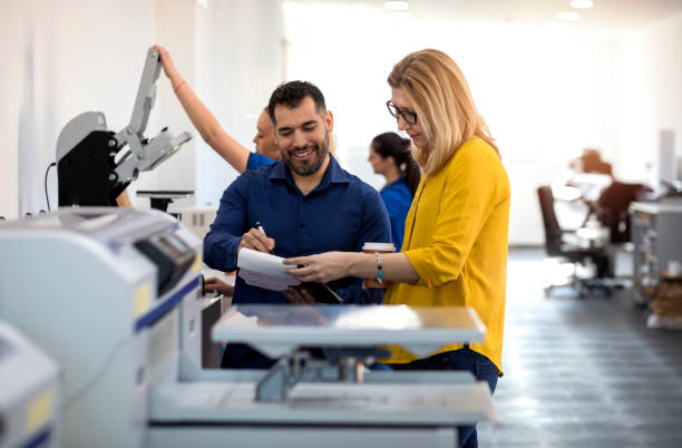 istock Coworkers in printing factory 1140358399