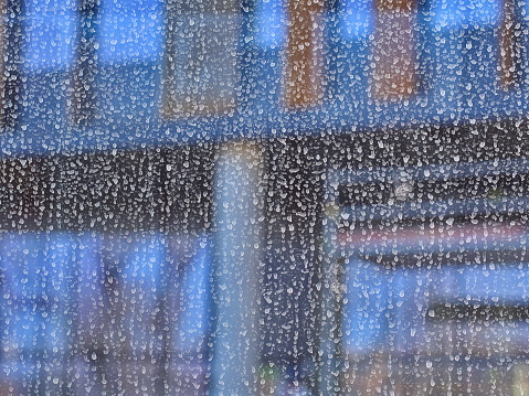 dry rain drops on the transparent window glass