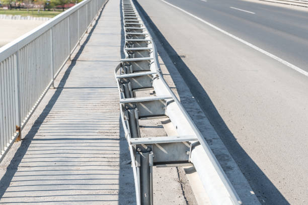 istock Damaged and broken security metal or iron fence on the bridge construction from car crash or traffic accident 1140362162