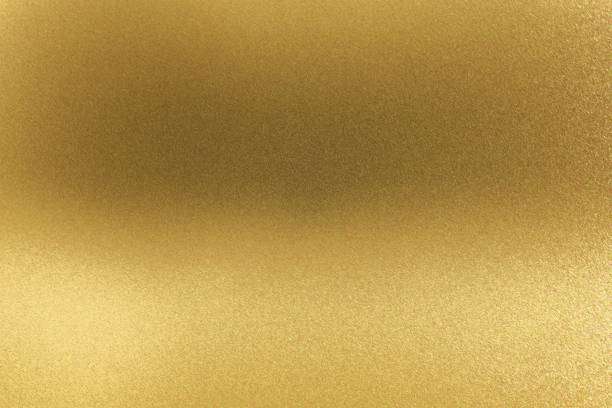istock Abstract texture background, glowing golden metal wall 1140364450