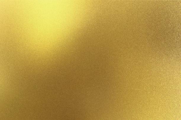 istock Abstract texture background, glowing golden metal plate 1140364452