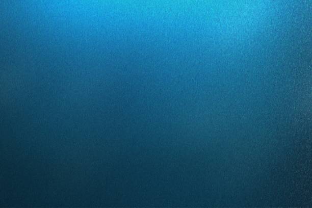 istock Abstract texture background, dark blue metallic wall in dark room 1140364454