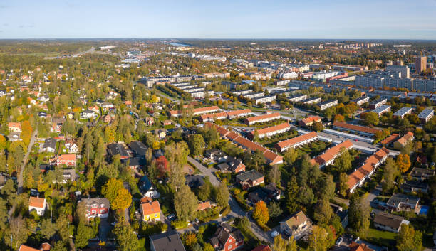 istock Flying over villa area, early fall day 1140364461