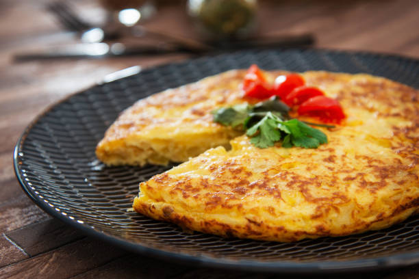 istock French Omelette with Potatoes, Mushroom and Salad 1140365785