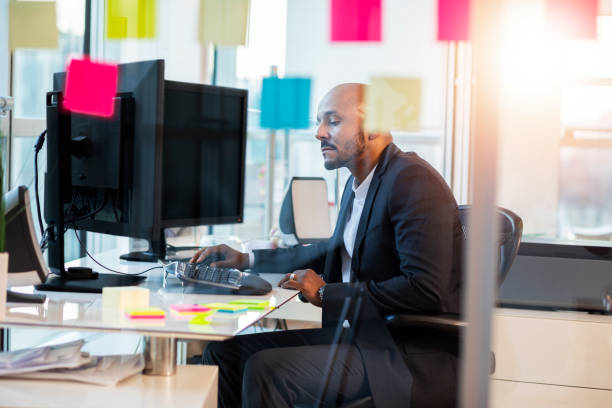istock Mature business man working at the office 1140367996