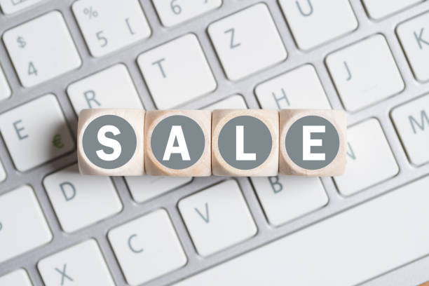istock cubes forming the word sale on a computer keyboard 1140369902