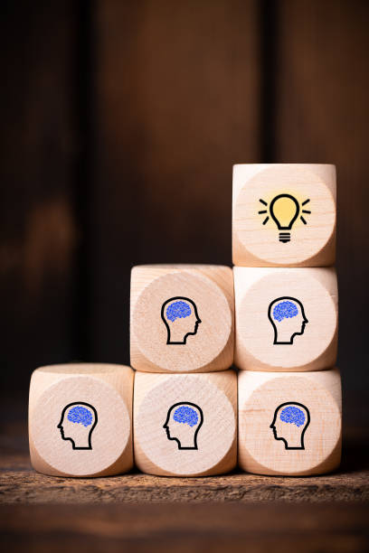 istock many people together having an idea symbolized by icons on cubes 1140370124