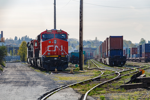 Drone shot of oil train cars at a chemical plant in Wyandotte, a small city south of Detroit in Wayne County, Michigan on an overcast day in Fall.