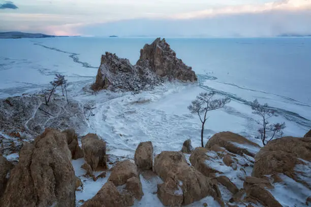 Lake Baikal. Island Olkhon. Shamanka Rock on a cloudy winter morning