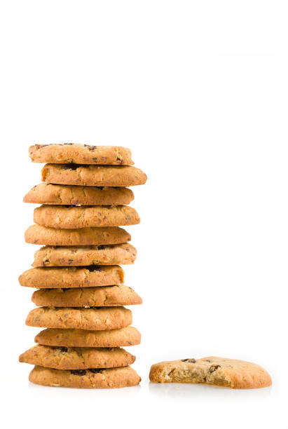 istock Stacked cookie tower on white background. Copy space. Poster concept. 1140376170