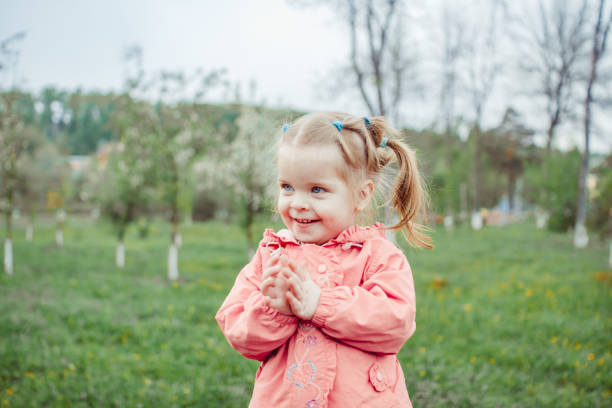 istock the little girl in the grass 1140382000