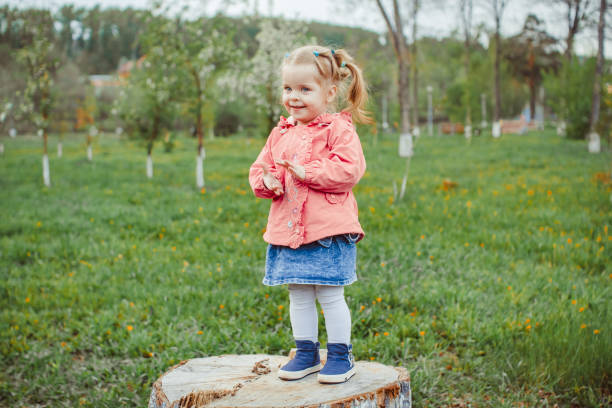 istock baby foot on a stump 1140382023