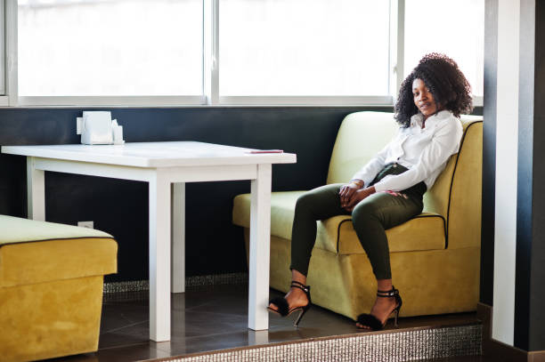 istock Cheerful business african american lady 1140382371