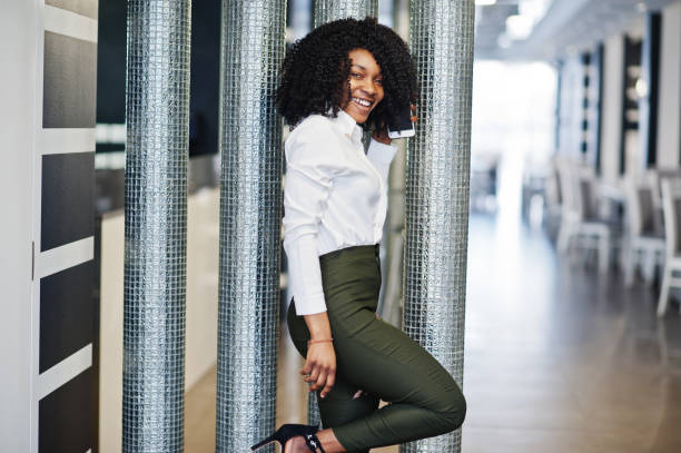 istock Cheerful business african american lady 1140382414
