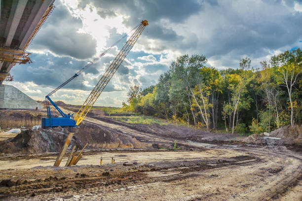 istock Hoisting crane on the construction of the bridge 1140383373