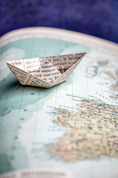 istock Origami travel concepts: Ship on map 1140384991