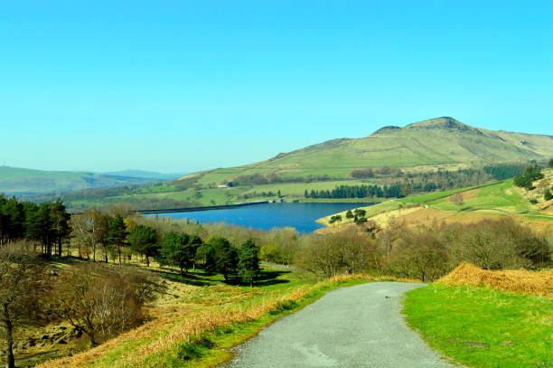 View over south end of Lake Windermere from the rocky summit of Gummers How on a lovely summers day. Gummers How is a popular viewpoint in the English Lake District, Cumbria, North West England, UK.