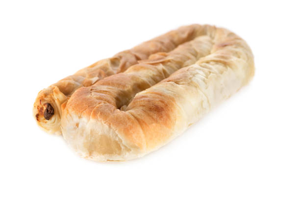 istock Placinta cake filled with a soft cheese. Isolated on a white background. 1140387580