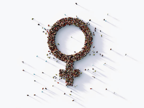 istock Human Crowd Forming Female Gender Symbol 1140387684