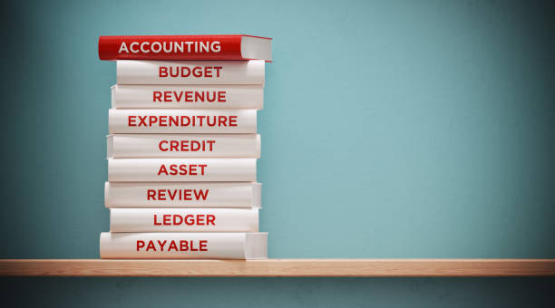 istock Books of  Accounting And Expenditure In Front Grey Wall 1140388957