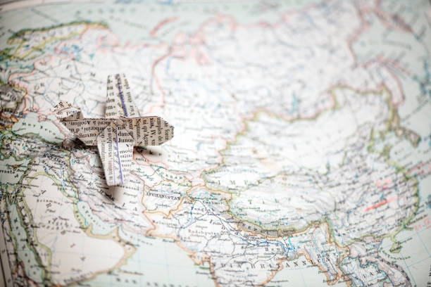 origami travel concepts: airplane flying on asia - old airplane macro horizontal imagens e fotografias de stock