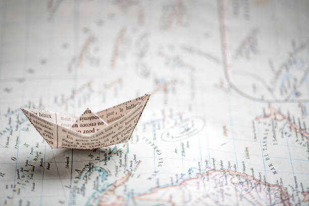 Origami travel concepts: Ship on map