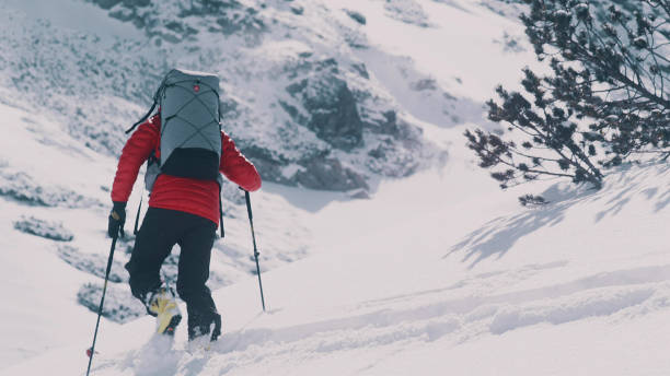 istock Winter mountain adventure. Man on a trail 1140390794