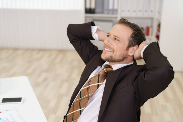 istock Relaxed successful businessman 1140392701