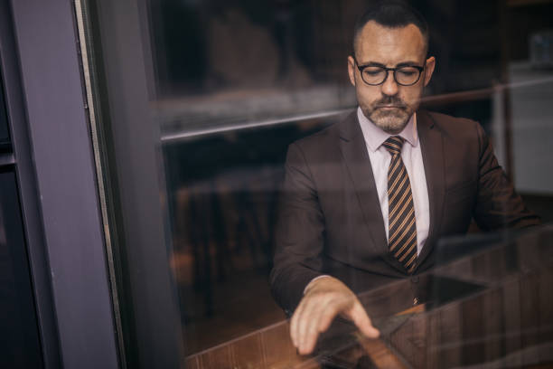 istock Senior businessman working on laptop 1140392947