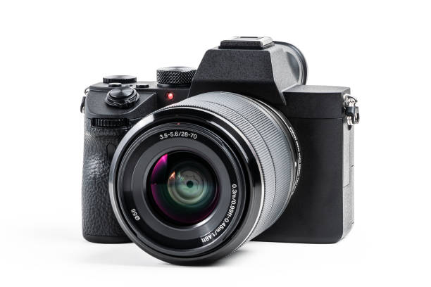 istock Camera isolated on white background with clipping path. Mirrorless camera isolated on white background. Clipping path for design and artwork. 1140393948