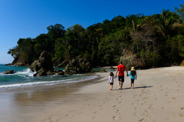 Family vacations at the beach Family vacation in Manuel Antonio National Park, Costa Rica manuel antonio national park stock pictures, royalty-free photos & images