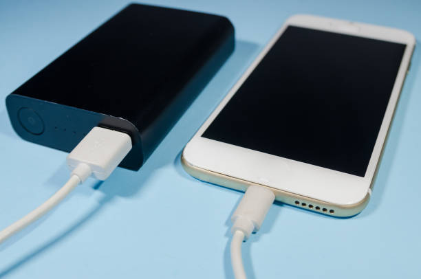 istock A charging phone with powerbank 1140397798