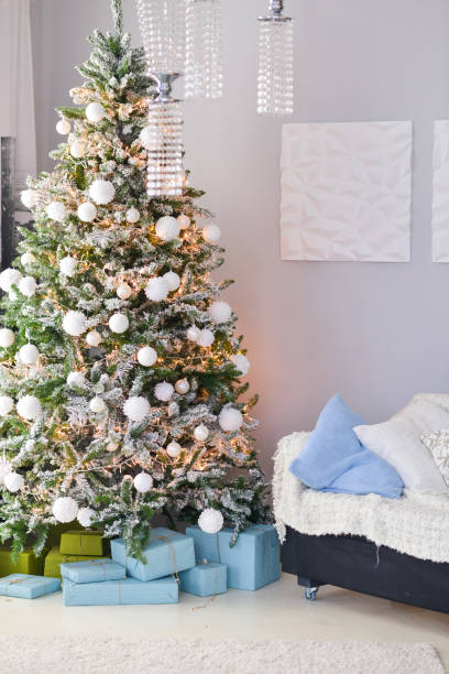 istock Christmas decor for table setting, or wedding decor, studio with a Christmas tree. Christmas decorations toys, candles, fir branches 1140397867