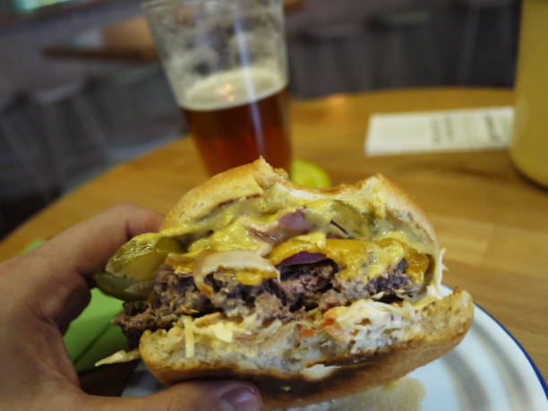 istock A glass of beer and a hamburger. 1140399089