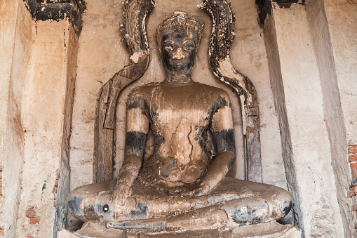 Crowned Buddha within the Meru at Wat Chaiwatthanaram, Ayutthaya, Thailand.