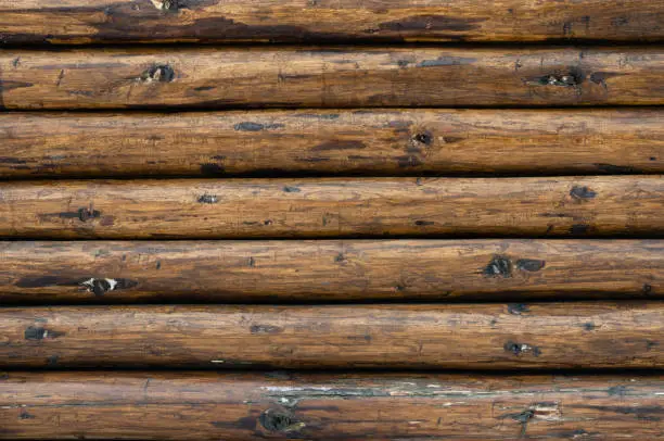 Photo of Brown-painted wall of a pine  wood chalet cottage