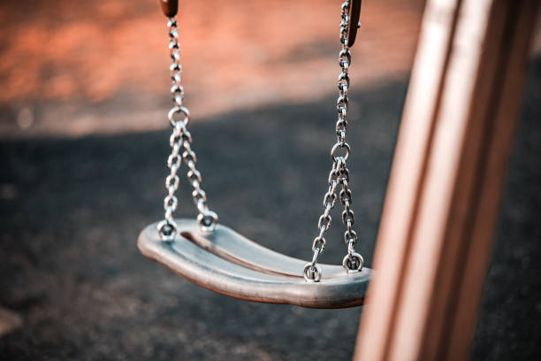 istock Children's chain swing on the Playground 1140404742