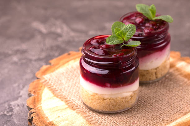 istock Cherry bisquit dessert with ricotta, mint. Yogurt cheesecake breakfast 1140405380