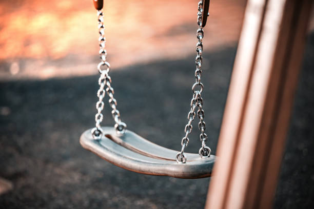 istock Children's chain swing on the Playground 1140407324