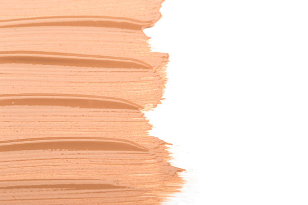 istock Close up of smear beige and ligth pink tone foundation texture for background. 1140407885