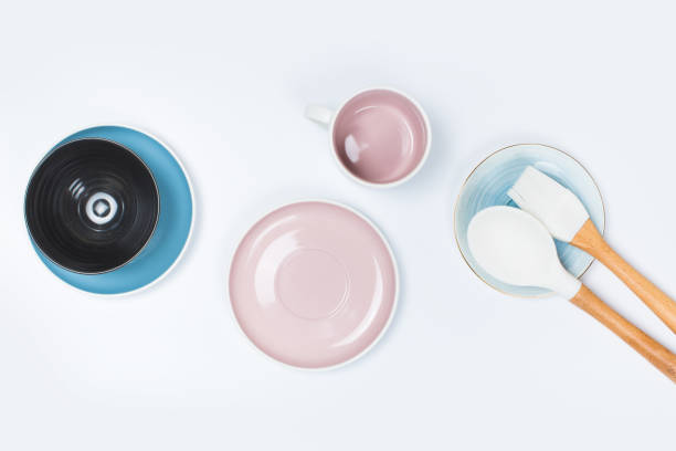 istock kitchen utensils, Clean  porcelain dishes on white  background 1140408031