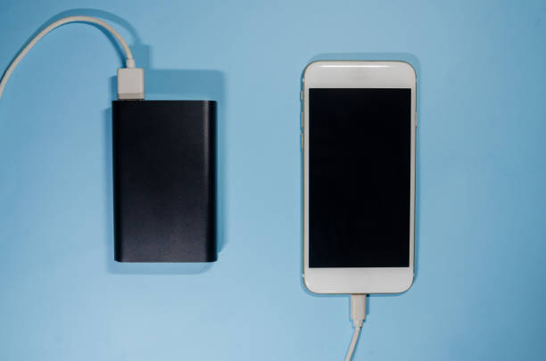 istock A charging phone with powerbank 1140410189