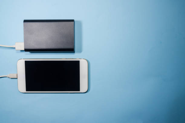 istock A charging phone with powerbank 1140410316