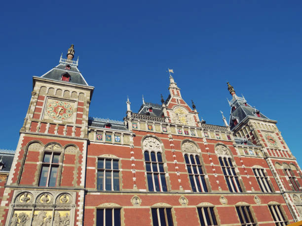 istock Visit Amsterdam and beautiful architecture of Centraal Railway Station 1140416914