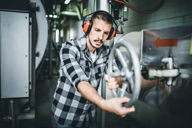 istock Young Technician is Inspecting Heating System in Boiler Room 1140422945