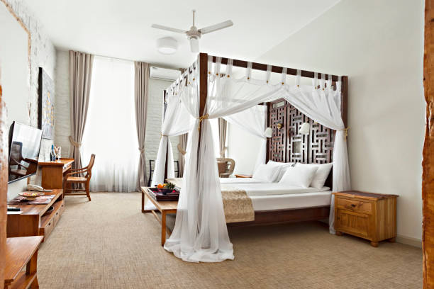 istock Luxurious modern bedroom interior with canopy bed 1140425306