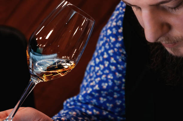 istock Cavist. Training in school sommelier. Wine school. Wine tasting. Tinted. 1140425654