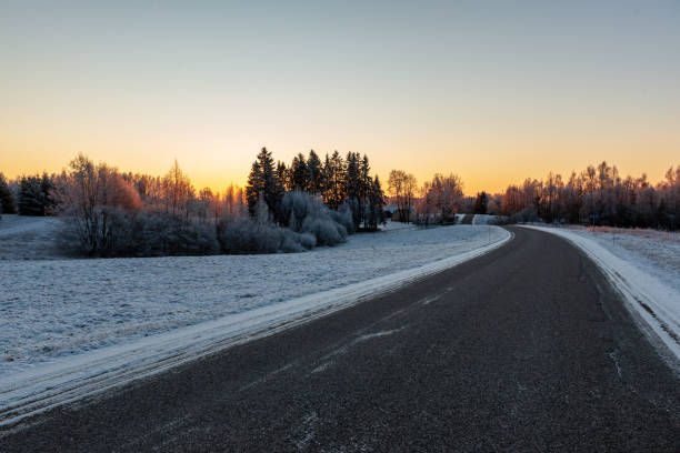 istock snowy winter road covered in ice and snow 1140436434