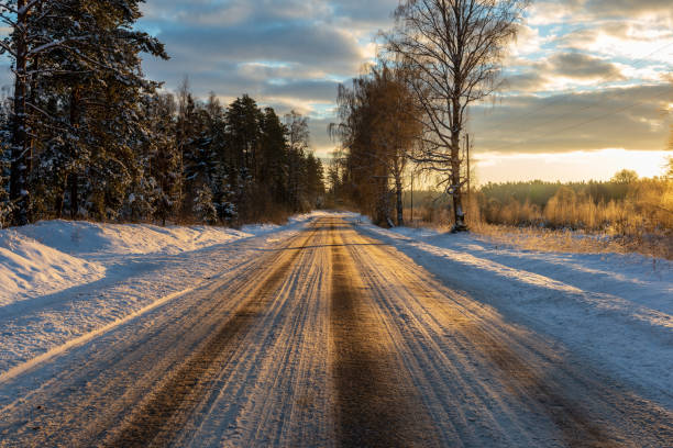 istock snowy winter road covered in ice and snow 1140436458