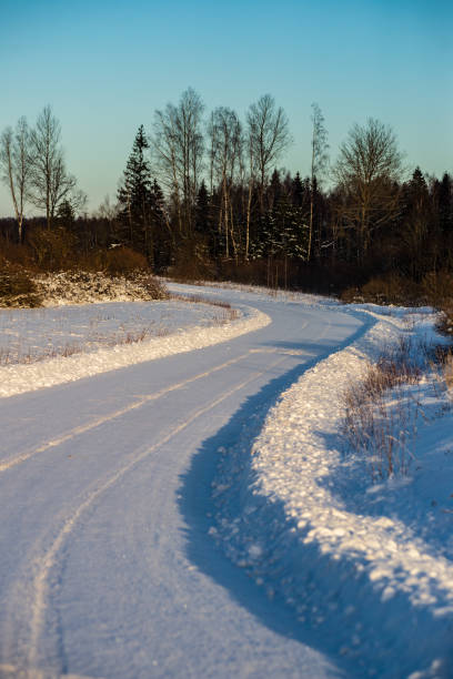 istock snowy winter road covered in ice and snow 1140439770